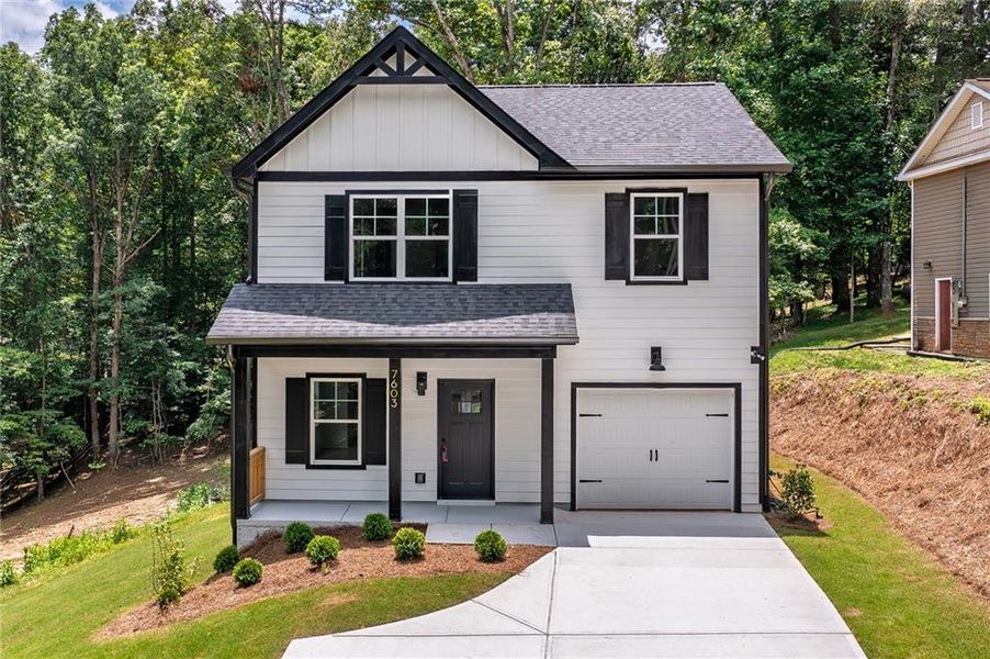 Front exterior of a new home in , Murrayville, GA, highlighting curb appeal (Image 21).