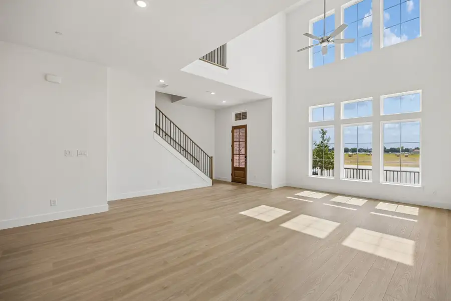 Spacious, unfurnished interior of a new home in Newman Village Townhomes, Frisco (Image 13).