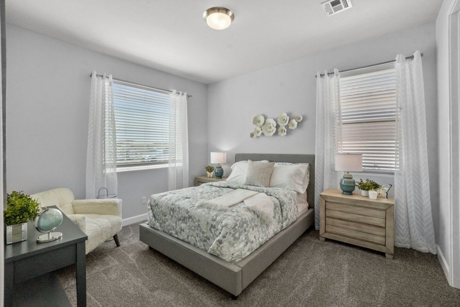 Representative furnished interior of a home built from the Capitan by Hakes Brothers in Hillside Park, El Paso (Image 13).