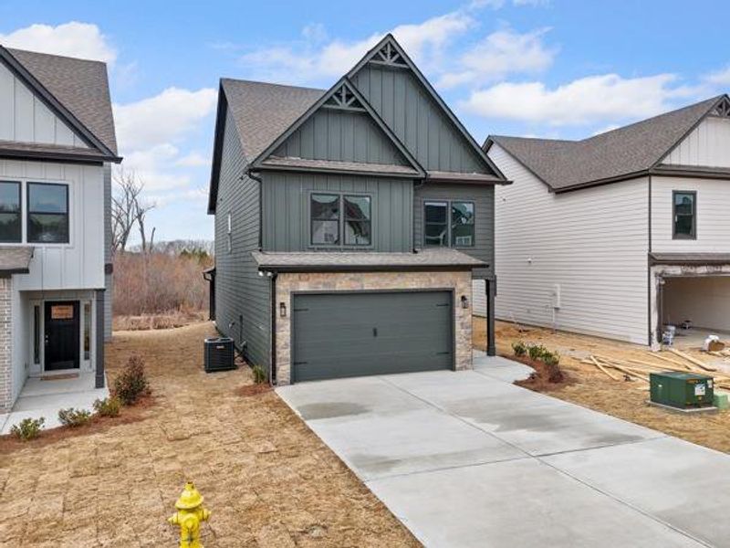 Front exterior of a new home in , Cartersville, GA, highlighting curb appeal (Image 1). Front exterior of a new home in , Cartersville, GA, highlighting curb appeal (Image 1).