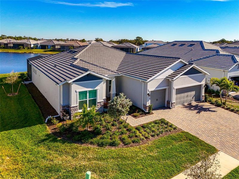 Front exterior of a new home in , Englewood, FL, highlighting curb appeal (Image 22). Front exterior of a new home in , Englewood, FL, highlighting curb appeal (Image 22).