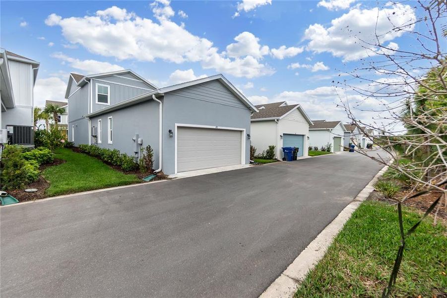 Front exterior of a new home in , Sarasota, FL, highlighting curb appeal (Image 14).