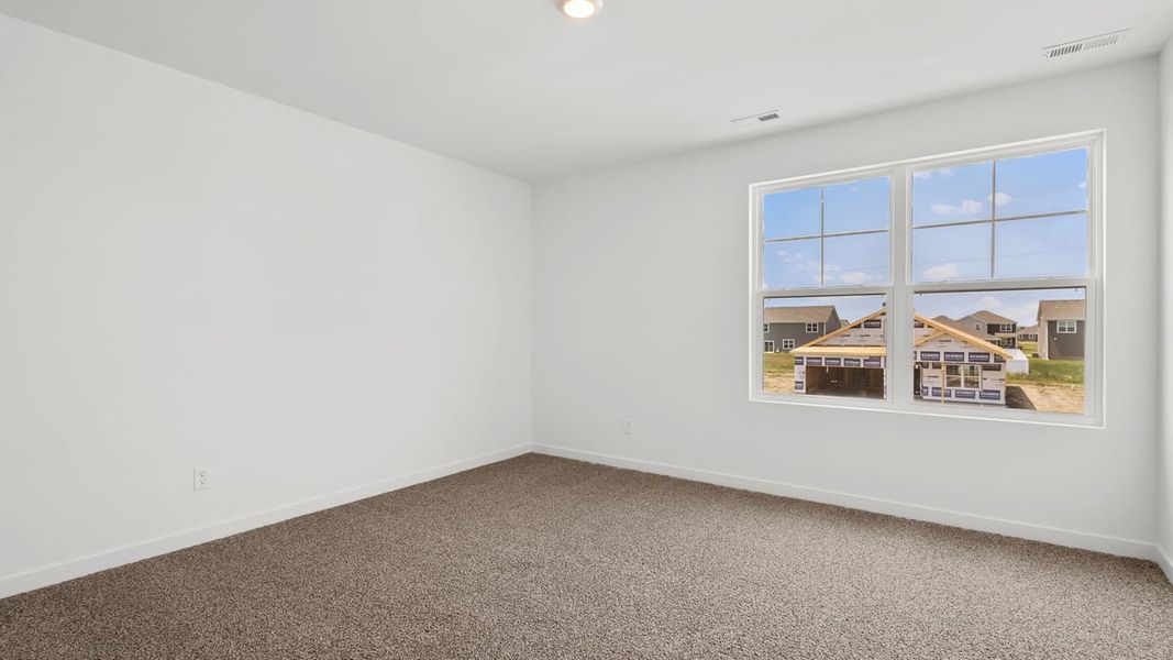 Representative unfurnished interior of a home built from the Holcombe by D.R. Horton in Peachtree Meadows, Rockwall (Image 38).