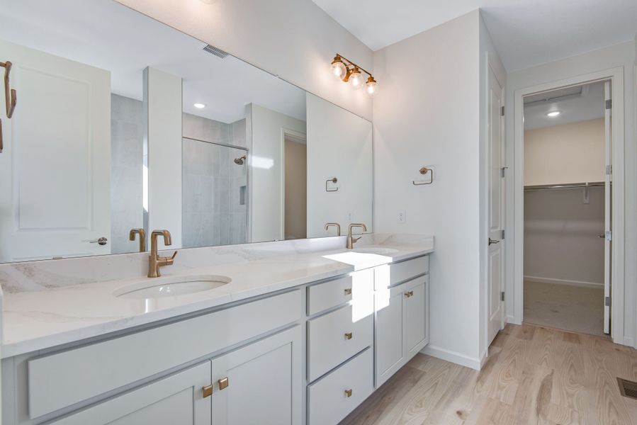Representative furnished interior of a home built from the 3510 by Tri Pointe Homes in Sterling Ranch, Littleton (Image 4).