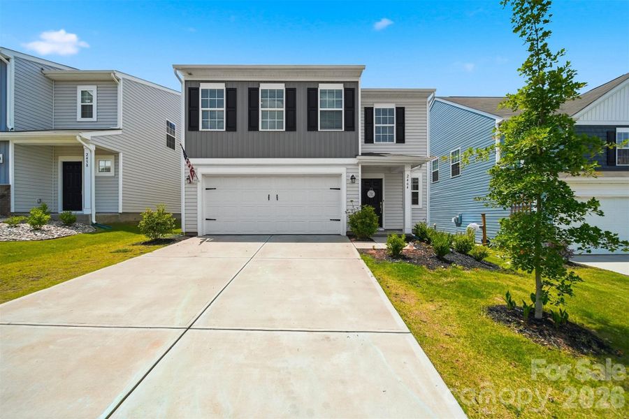 Front exterior of a new home in Legacy Ridge, Catawba, NC, highlighting curb appeal (Image 2). Front exterior of a new home in Legacy Ridge, Catawba, NC, highlighting curb appeal (Image 2).