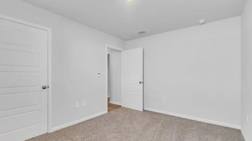 Spacious, unfurnished interior of a new home in Saunders Village, Northwest (Image 20). Spacious, unfurnished interior of a new home in Saunders Village, Northwest (Image 20).