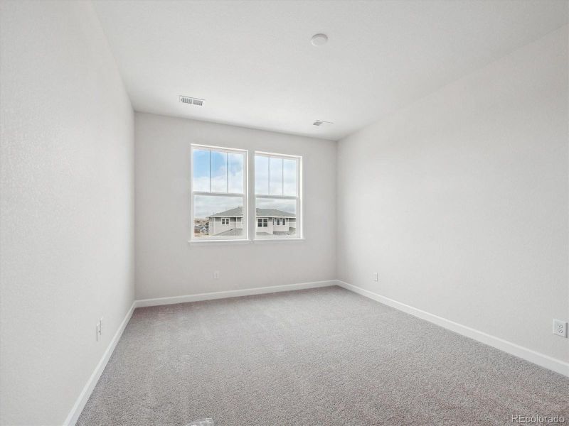 Spacious, unfurnished interior of a new home in Vista Pines at Crystal Valley, Castle Rock (Image 35).