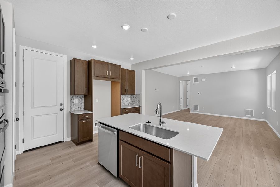 Furnished interior view inside a new home in Trailstone, Arvada (Image 14).