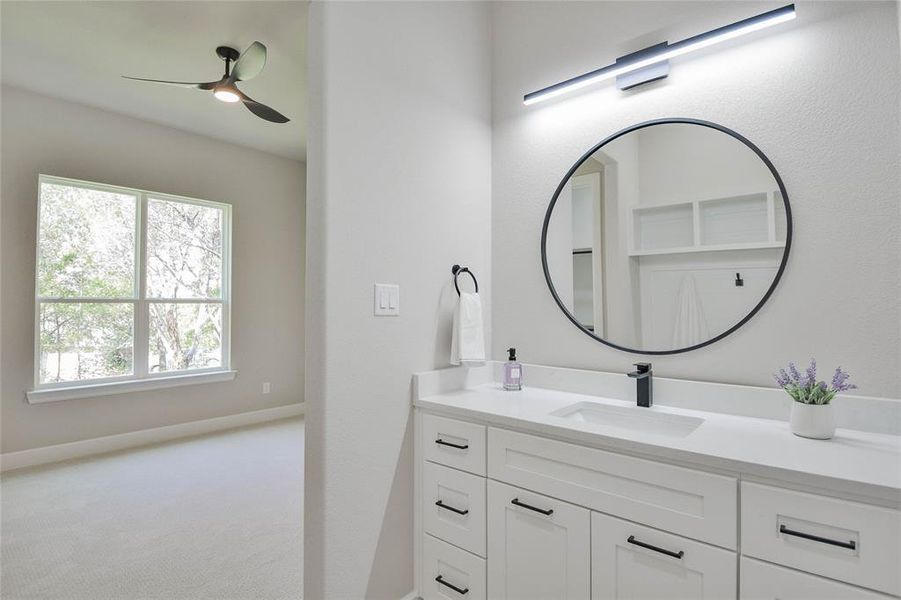 Bathroom with vanity and ceiling fan Bathroom with vanity and ceiling fan