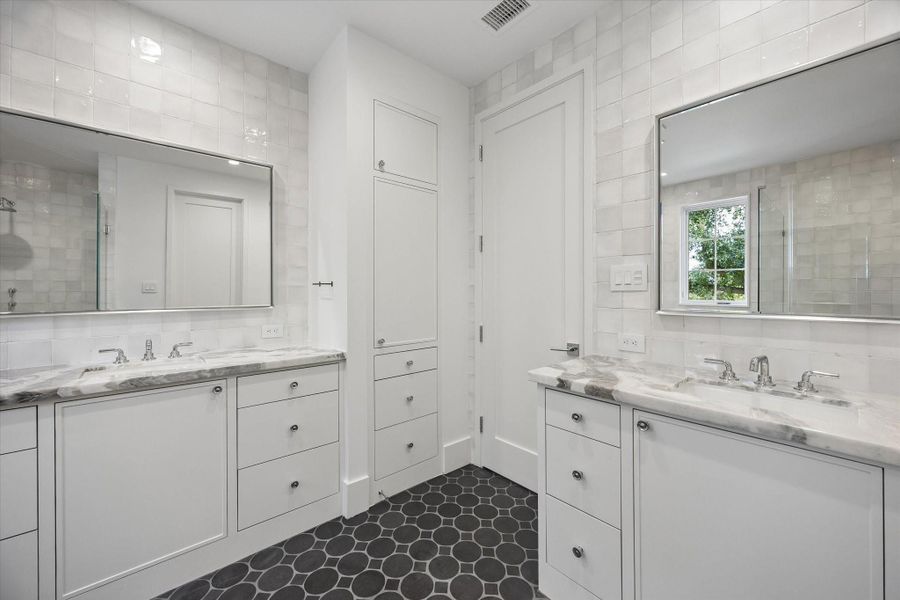 Dual marble top vanities, separate shower and private w/c Dual marble top vanities, separate shower and private w/c
