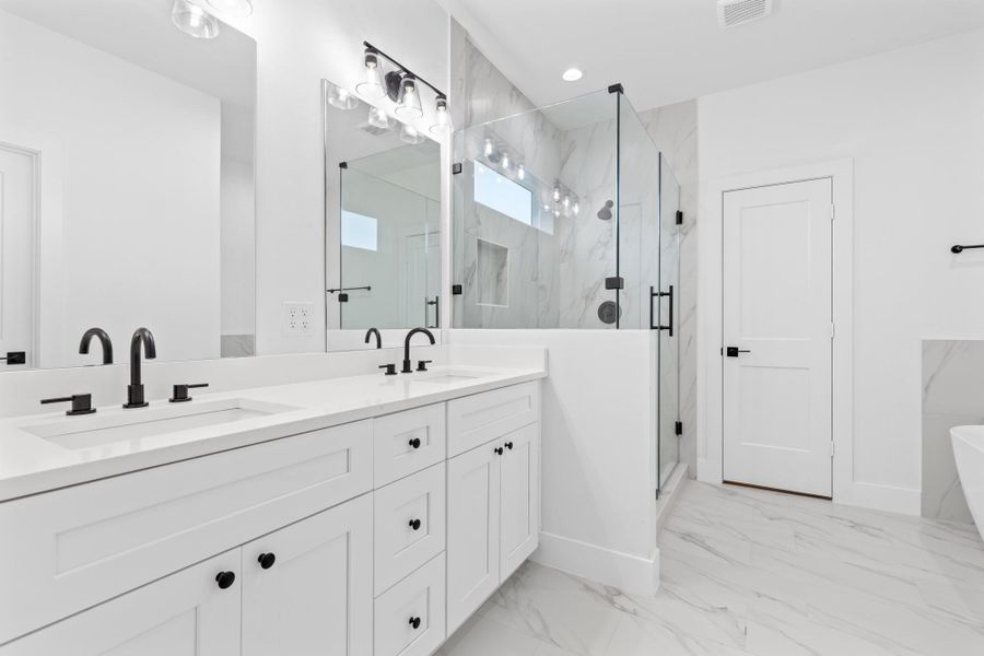 Primary bath with separate stand up shower. Primary bath with separate stand up shower.