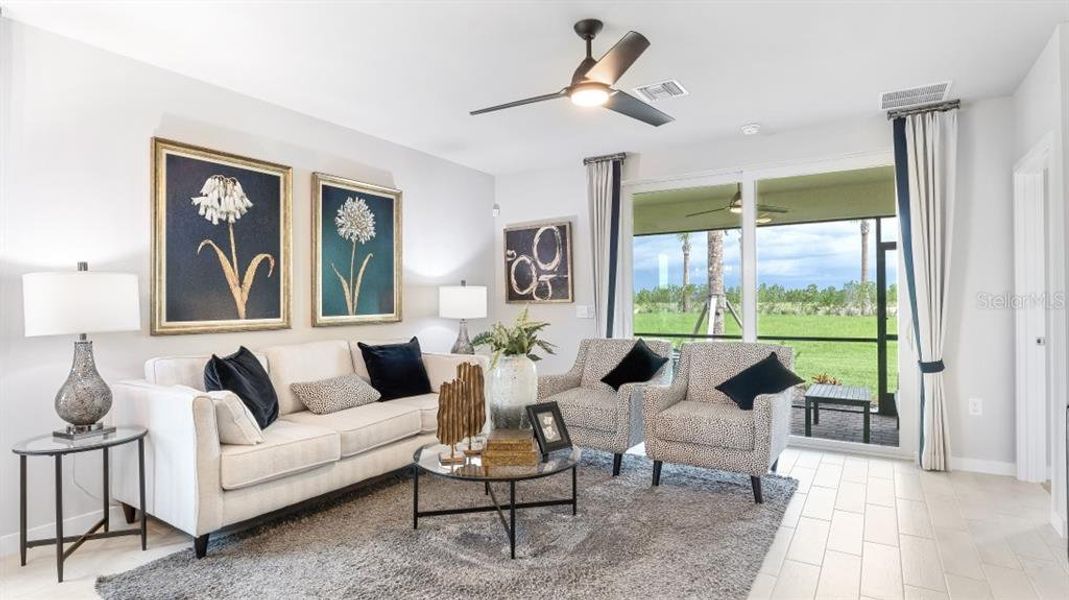Furnished interior view inside a new home in Halifax Plantation Villas, Ormond Beach (Image 8).