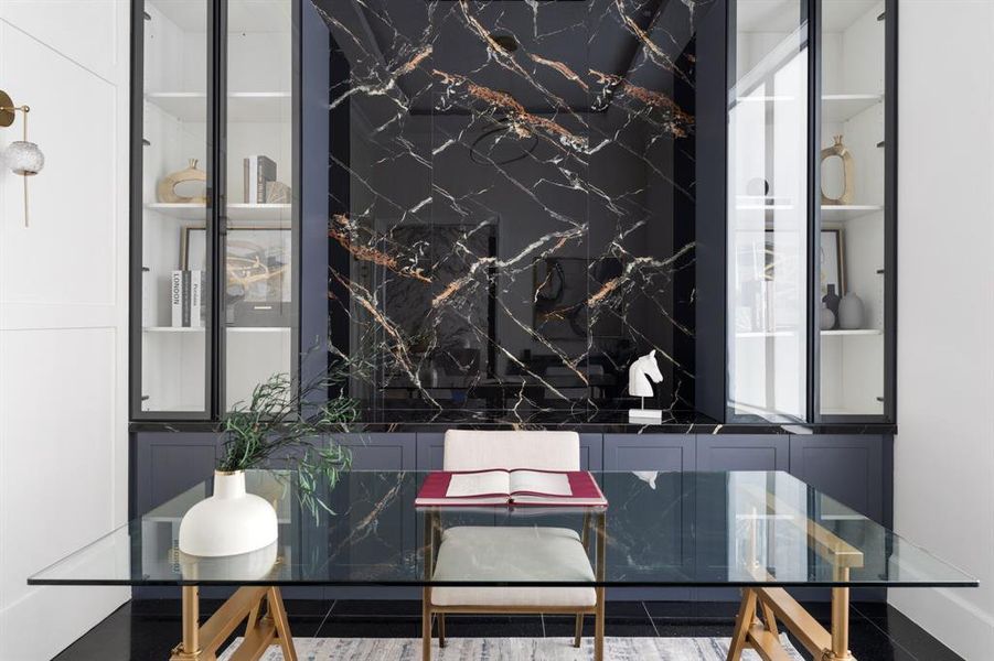 Elevate your workspace with custom cabinetry, marble-clad walls, and smart windows for privacy, creating a stylish and functional environment for working from home.