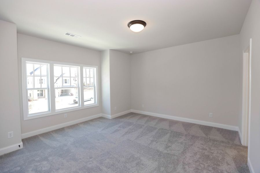Representative unfurnished interior of a home built from the The Maddox by The Providence Group in Bellmoore Park, Johns Creek (Image 39).
