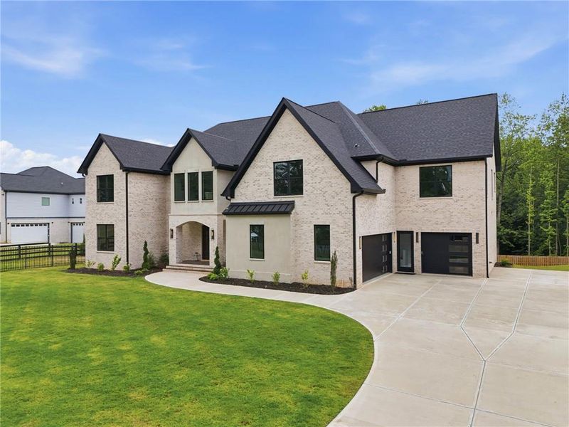 Front exterior of a new home in , Buford, GA, highlighting curb appeal (Image 23). Front exterior of a new home in , Buford, GA, highlighting curb appeal (Image 23).
