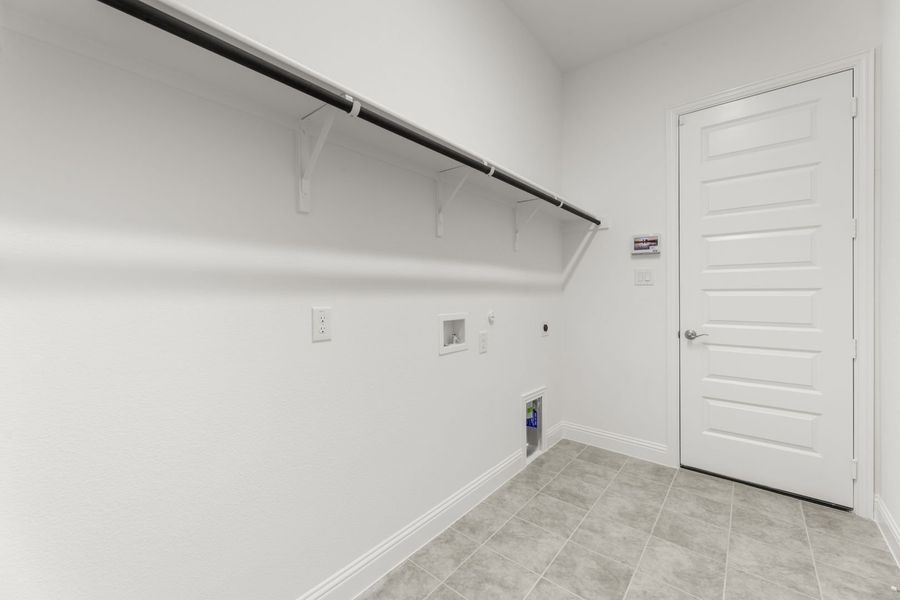 Representative unfurnished interior of a home built from the Del Rio by Windsor Homes in Anna Town Square, Anna (Image 29).