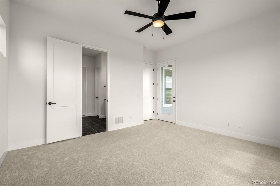 Spacious, unfurnished interior of a new home in Wolf Ranch - Enclave Collection, Colorado Springs (Image 32).