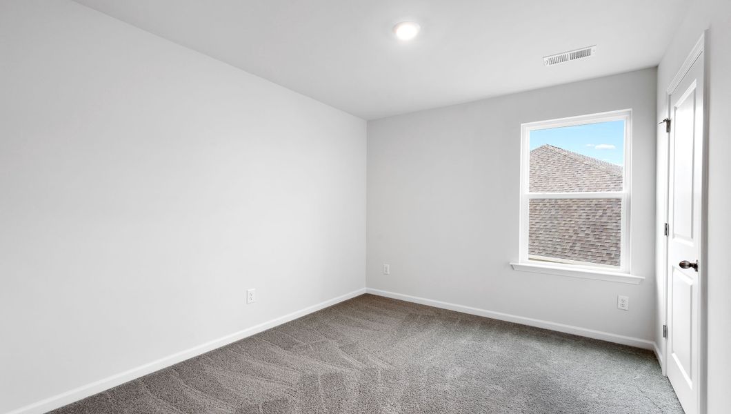 Representative unfurnished interior of a home built from the BELHAVEN by D.R. Horton in Benjamin's Grove, Woodruff (Image 27).