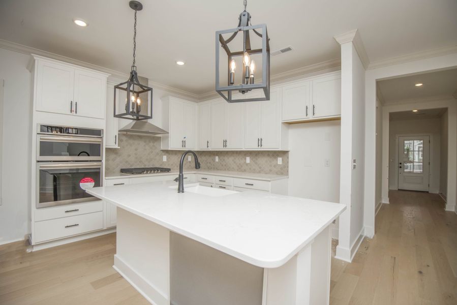 *Photo of example home. Selections and Finishes May Vary.*