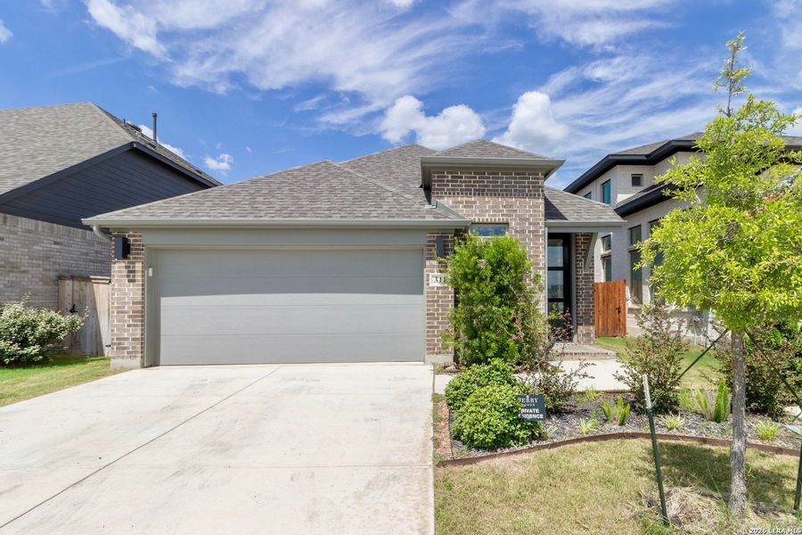 Front exterior of a new home in Legacy at Lake Dunlap, New Braunfels, TX, highlighting curb appeal (Image 1). Front exterior of a new home in Legacy at Lake Dunlap, New Braunfels, TX, highlighting curb appeal (Image 1).
