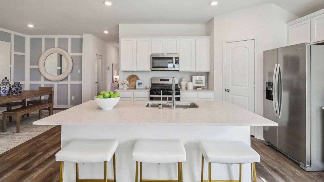 Furnished interior view inside a new home in Sunterra, Katy (Image 13).
