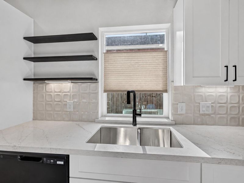 Designer floating shelving and backsplash Designer floating shelving and backsplash