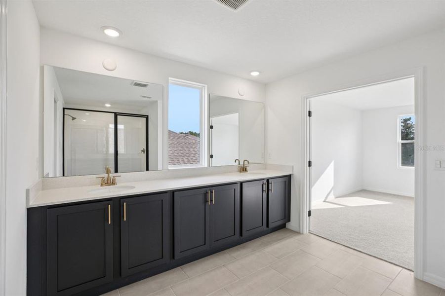 Furnished interior view inside a new home in Northlake at Ovation, Winter Garden (Image 12).