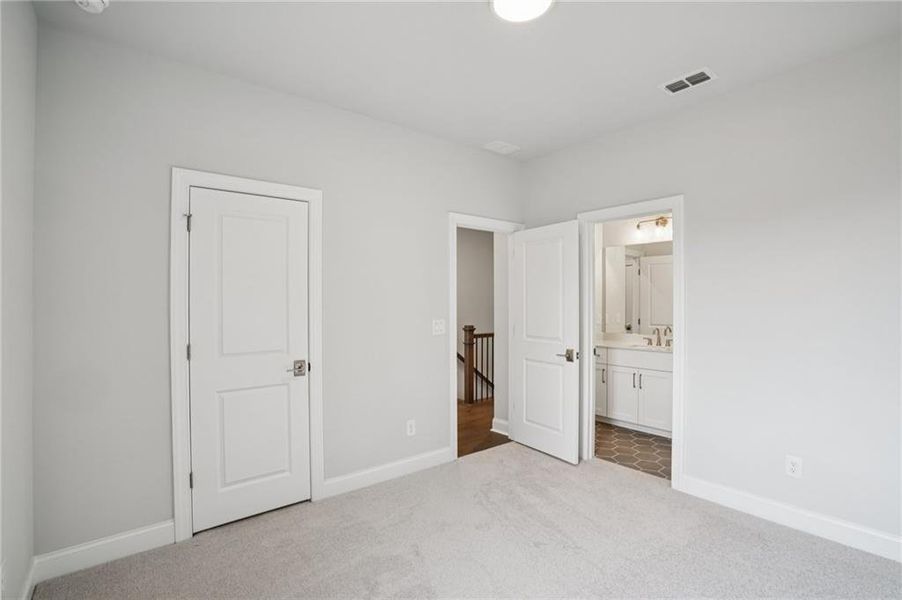 Spacious, unfurnished interior of a new home in Ward's Crossing Townhomes, Johns Creek (Image 26).