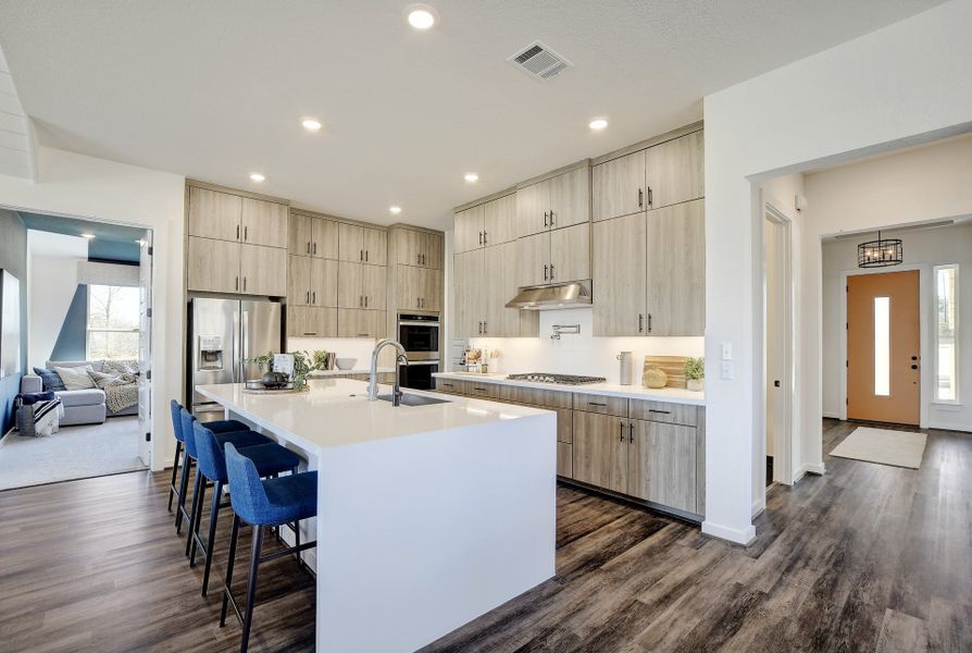 Representative furnished interior of a home built from the Jester by Scott Felder Homes in Prominence, San Antonio (Image 6).