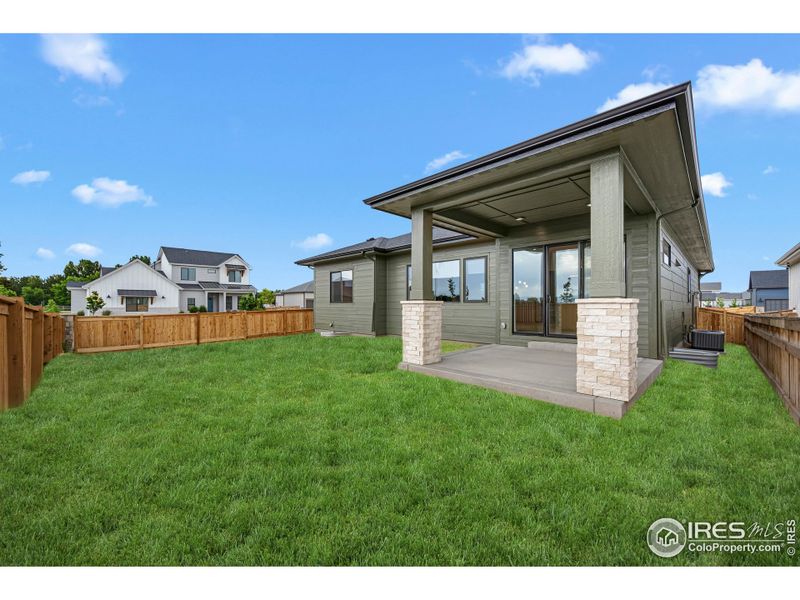 Front exterior of a new home in , Windsor, CO, highlighting curb appeal (Image 16).