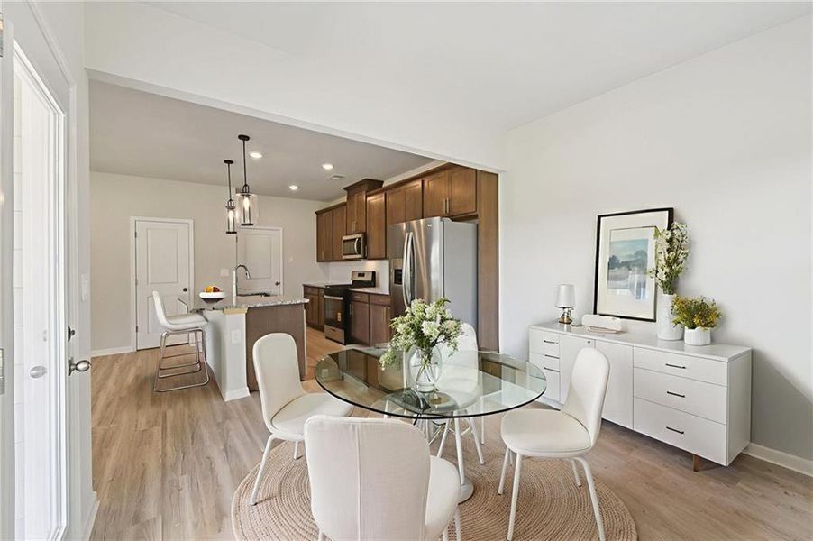 Furnished interior view inside a new home in Avalon - Reserve Series, Conyers (Image 7).