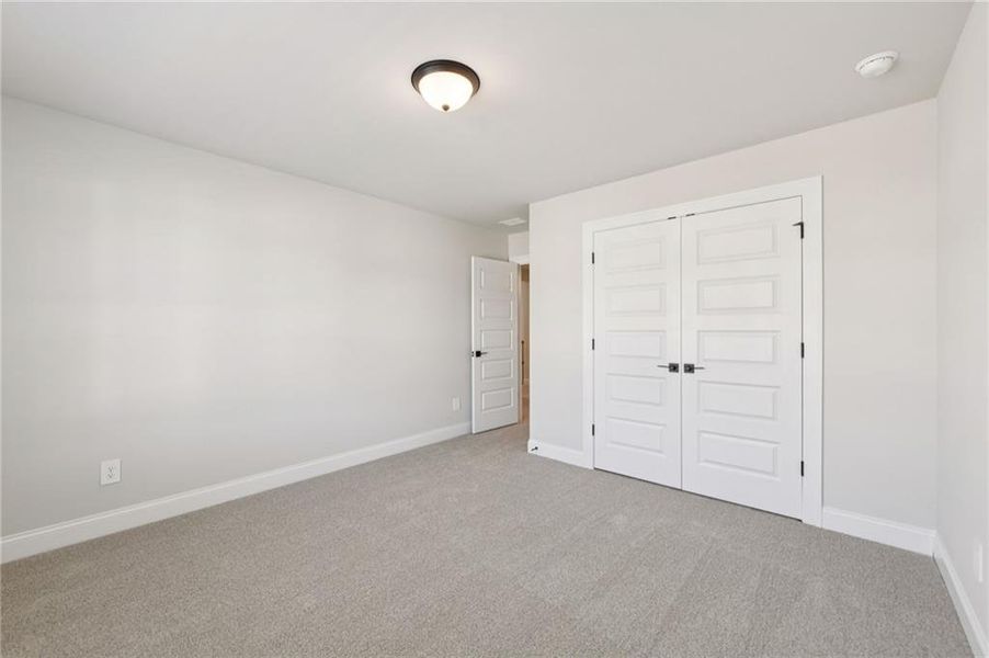 Spacious, unfurnished interior of a new home in Vines at Mill Creek - Estate Series, Braselton (Image 38).