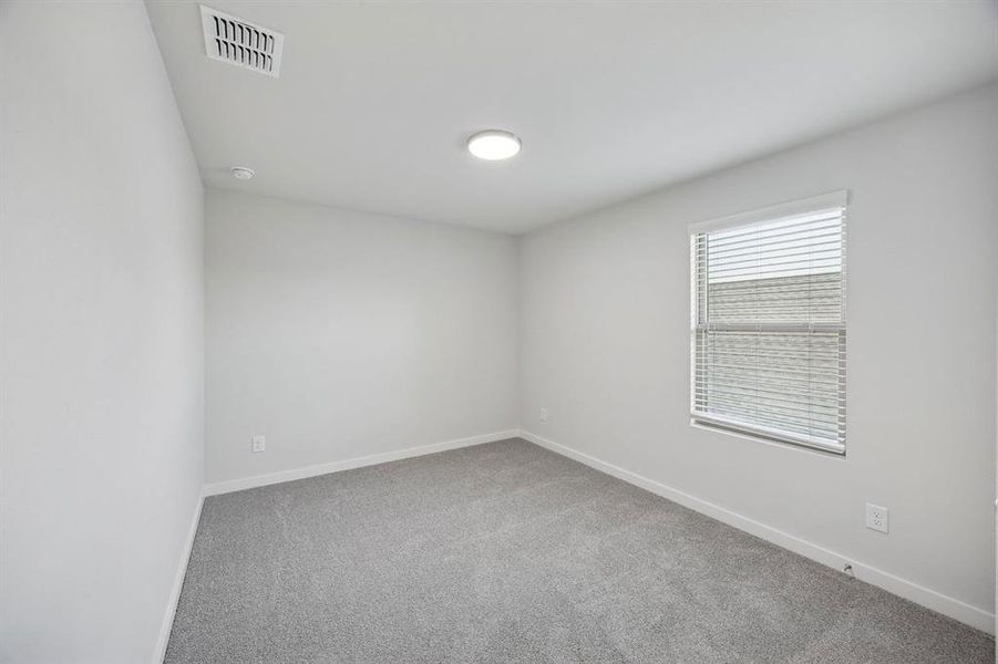 Bedroom in the Oak II home plan by Trophy Signature Homes – REPRESENTATIVE PHOTO Bedroom in the Oak II home plan by Trophy Signature Homes – REPRESENTATIVE PHOTO