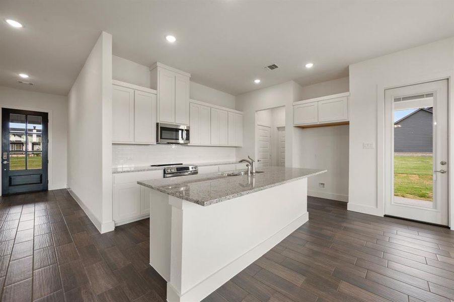 Furnished interior view inside a new home in Saddleback Estates, Boyd (Image 4).