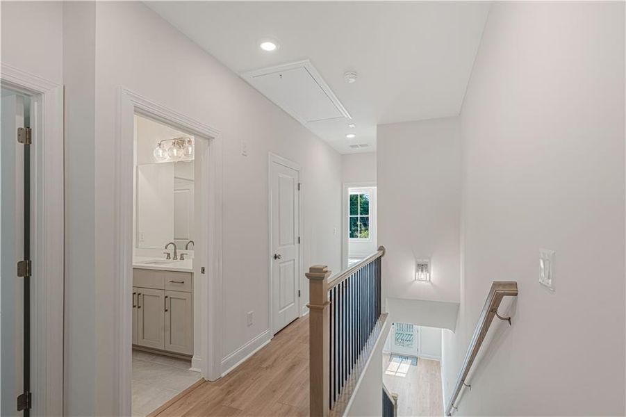 Furnished interior view inside a new home in Ward's Crossing Townhomes, Johns Creek (Image 17).