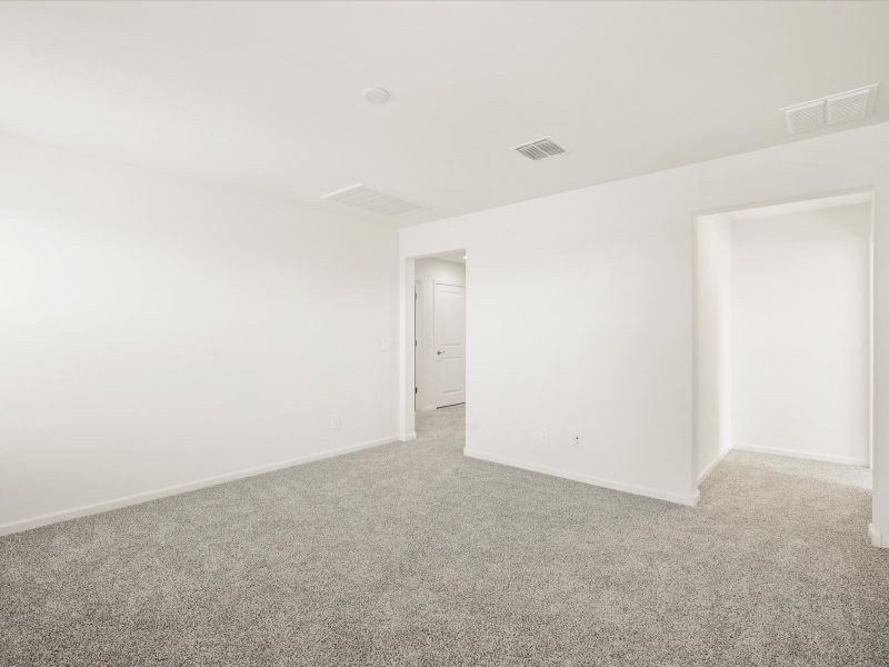 Spacious, unfurnished interior of a new home in Mandarina - Premier Series, Marana (Image 13).