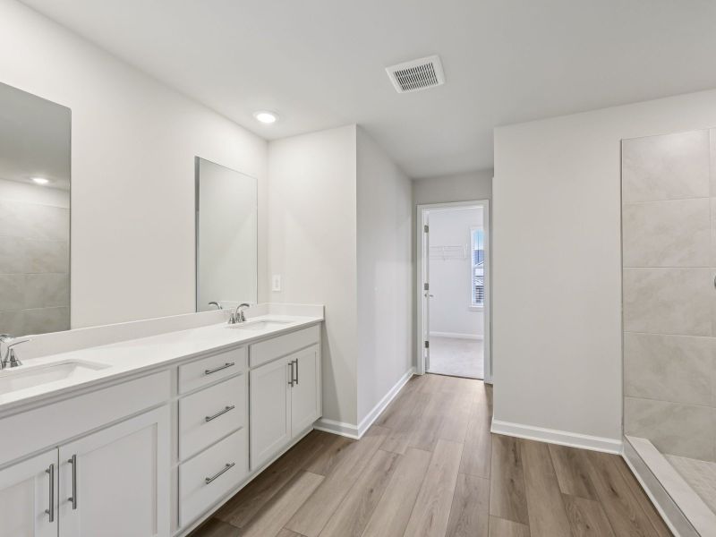 Furnished interior view inside a new home in Northwoods at Mirror Lake, Villa Rica (Image 8).