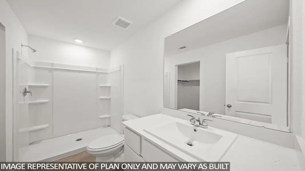 A well-appointed bathroom features a single vanity and a shower-tub combination.