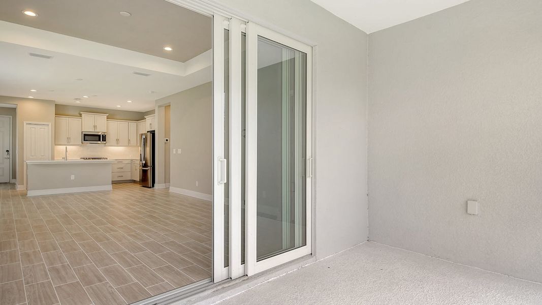Spacious, unfurnished interior of a new home in Canoe Creek Real Estate and Homes for Sale in Parrish, FL - Neal Communities, Parrish (Image 9).