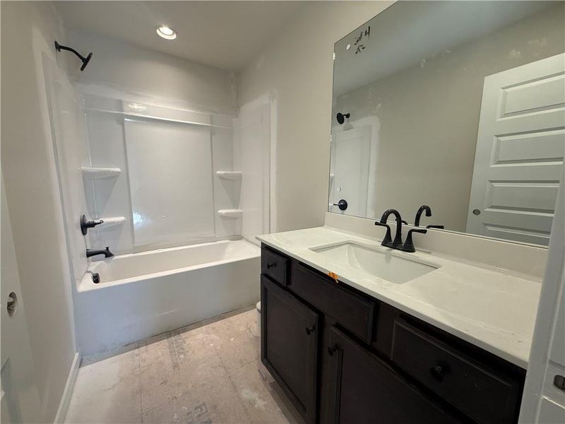 Furnished interior view inside a new home in The Towns at Auburn Station East, Auburn (Image 6).