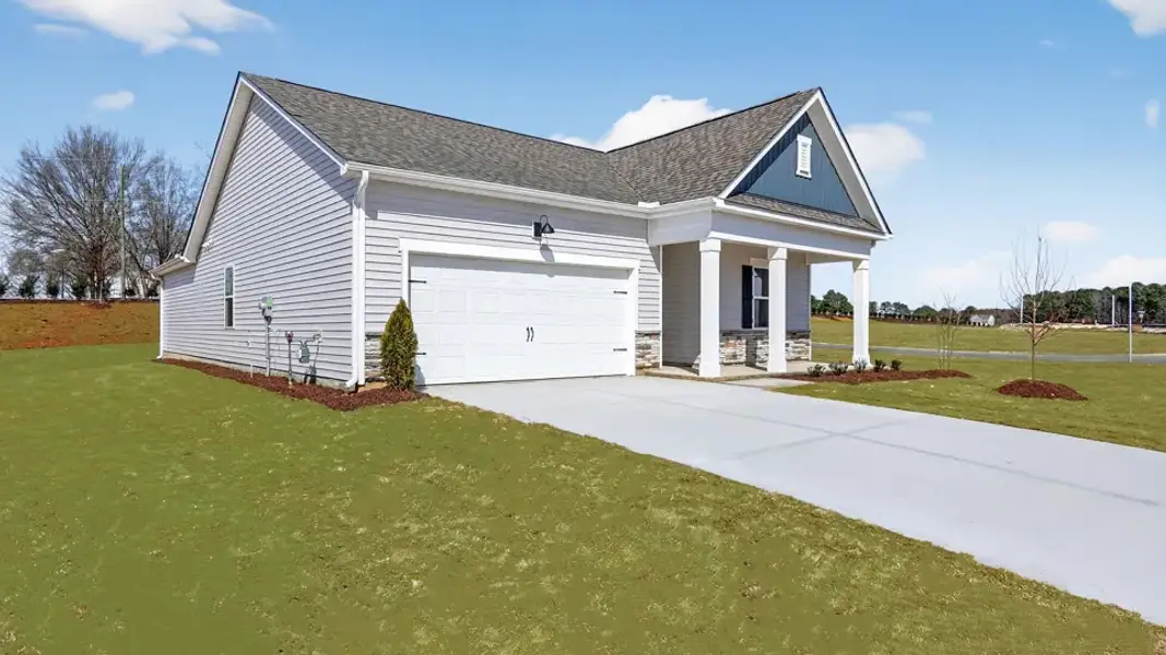 Front exterior of a new home in Honeycutt Oaks, Angier, NC, highlighting curb appeal (Image 19).