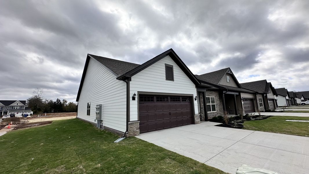 Front exterior of a new home in Veterans Cove, Murfreesboro, TN, highlighting curb appeal (Image 30).