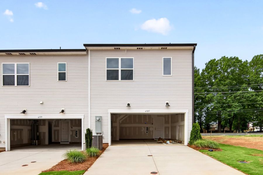 Front exterior of a new home in Amplitude, Charlotte, NC, highlighting curb appeal (Image 23).