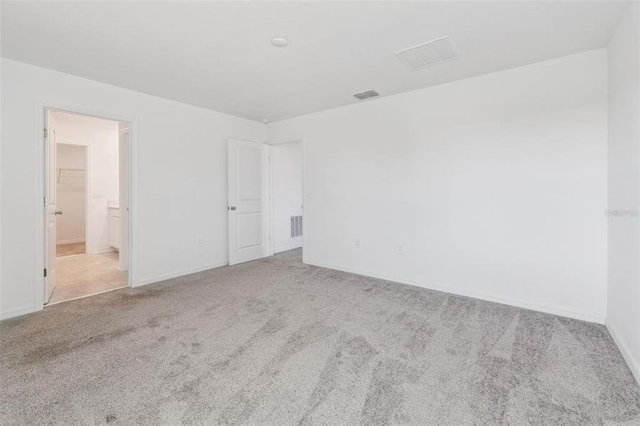 Spacious, unfurnished interior of a new home in Peace Creek Reserve: Legacy Collection, Winter Haven (Image 10). Spacious, unfurnished interior of a new home in Peace Creek Reserve: Legacy Collection, Winter Haven (Image 10).