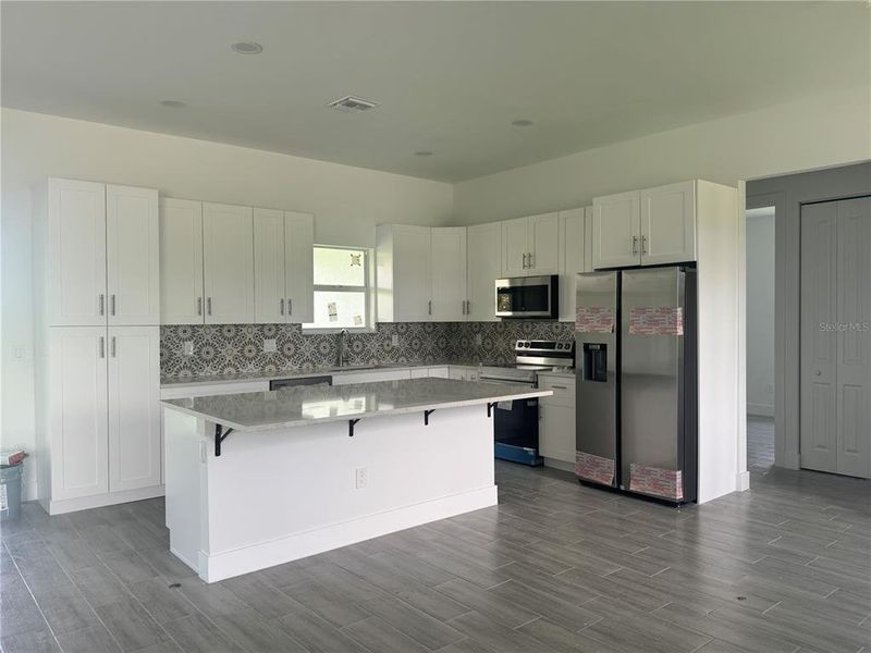 Furnished interior view inside a new home in , Port Charlotte (Image 4).