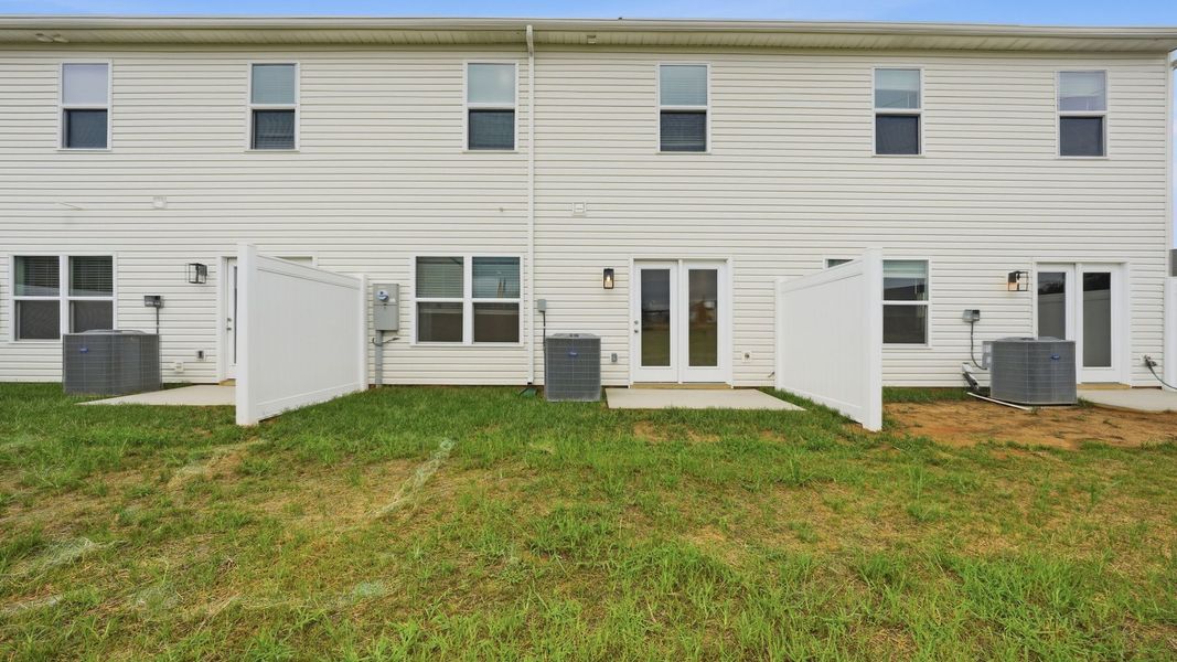 Exterior details and patio area of a home in Fieldcrest Acres Townhomes, Blountville (Image 17).