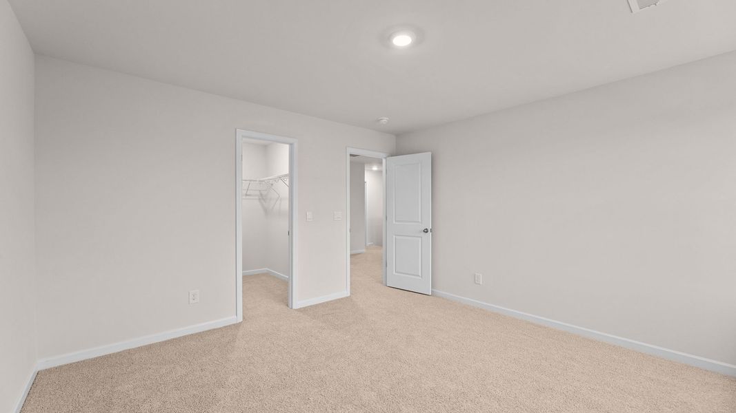Spacious, unfurnished interior of a new home in Ridgewood Farms, Winterville (Image 24).