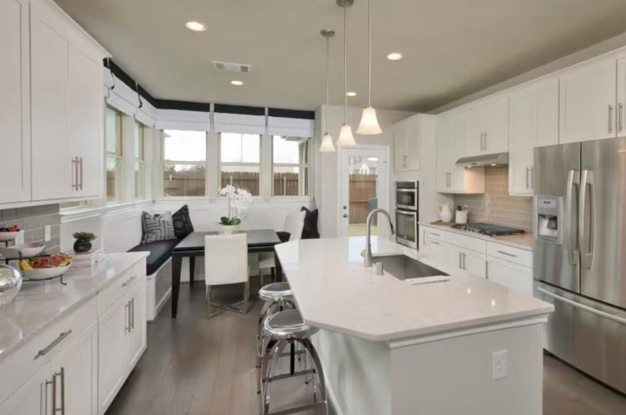 Photo of Pulte model home with same floor plan, not of actual home listed.