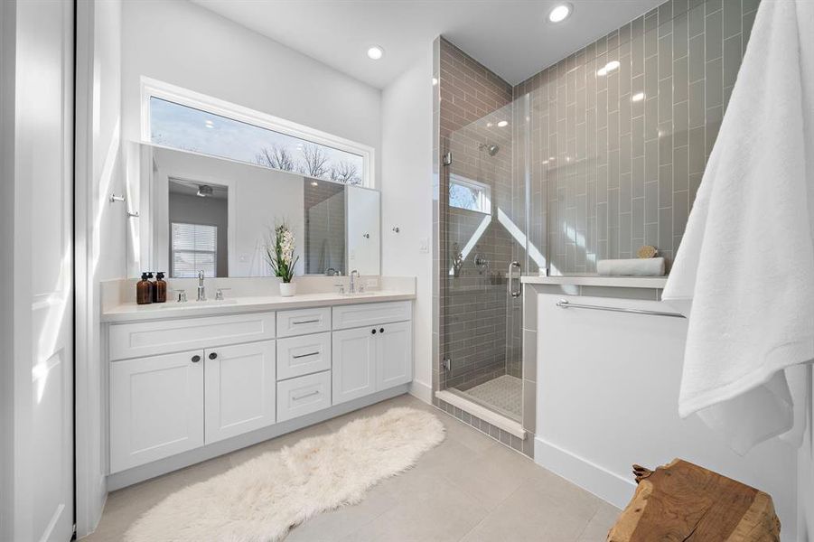 TRANSOM WINDOW in the primary bathroom! Double sinks! Plenty of counterspace and storage and recessed lighting!