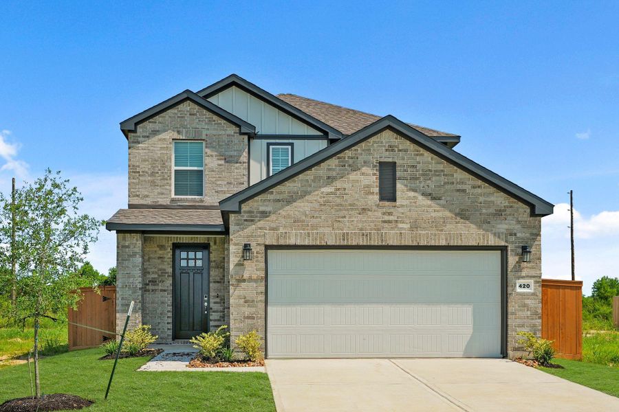 Front exterior of a new home in River Ranch Trails, Dayton, TX, highlighting curb appeal (Image 18).